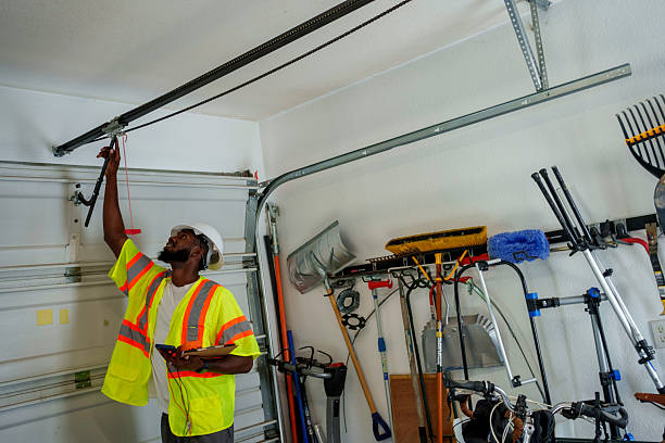Professional Garage Door Panel Replacement technician working in Sherman County County, OR